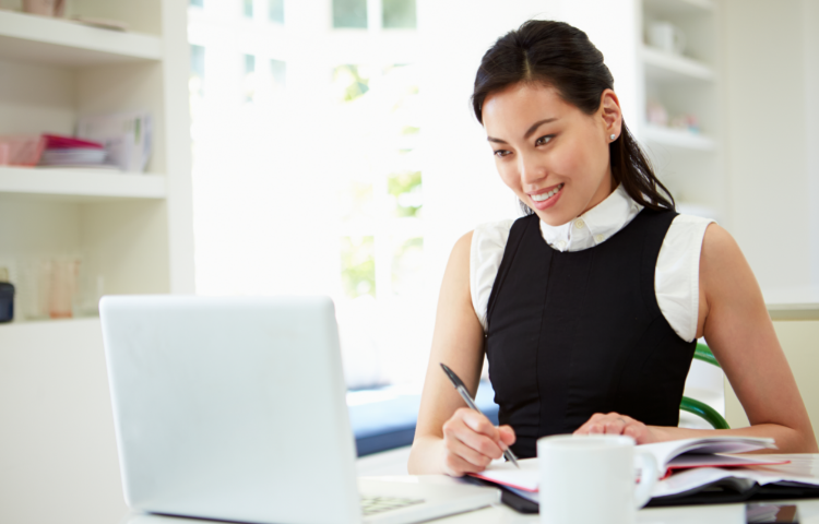 Women using a computer while working.